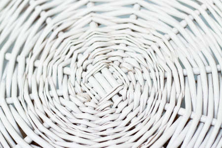 The texture of white straw basket, like a spider's webの写真素材