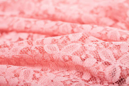 Texture of pink lace. Delicate gypery. A good background on topics related to fabrics, linen, needlework, etc.の写真素材