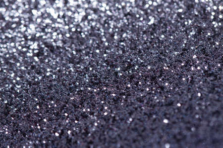 Purple festive background with sparkles in the bokeh. The concept of the celebration, the day of St. Valentine, New Year, birthdays, ceremonies, events, etc.の写真素材