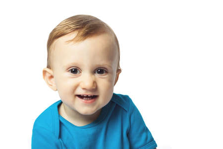 Portrait of cute baby boy isolated on the white background. Copy space. One year boy with first teethの写真素材