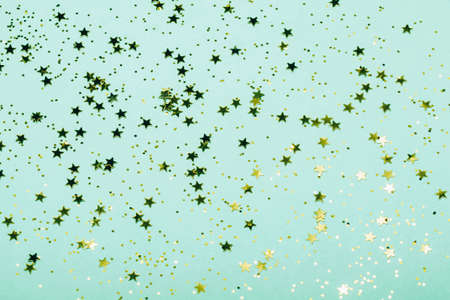 Trendy mint background with gold stars. The concept of celebrations, the Day of St. Valentine,...
