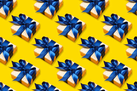 Pattern of trendy attractive gifts with blue bowの写真素材
