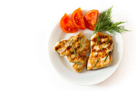 Grilled chicken breasts and vegetablesの写真素材