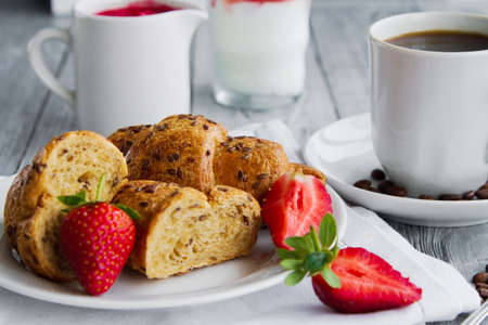 healthy breackfast for healthy Breakfast with delicious croissant and strawberries for early morningの写真素材