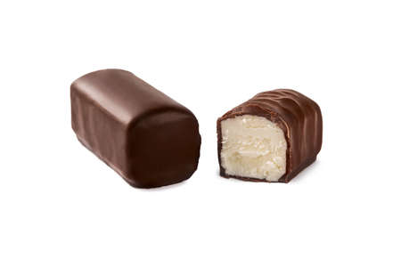 Glazed cheese in milk chocolate broken into halves on a white isolated backgroundの写真素材