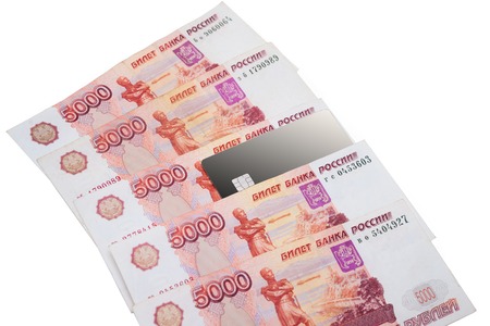 Blank credit card and Russian bank notes isolated on white background, Russia national payment...