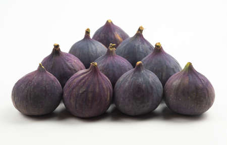 Ripe fresh figs close up on white backgroundの写真素材