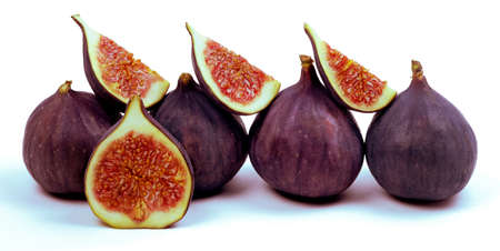 Fig isolated on white backraund. Fresh whole and sliced fig. Clipping pathの写真素材