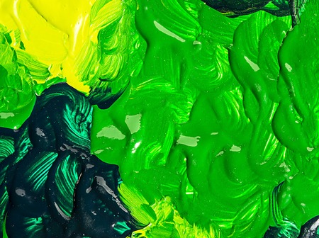 Abstract yellow green acrylic background hand paintedの写真素材