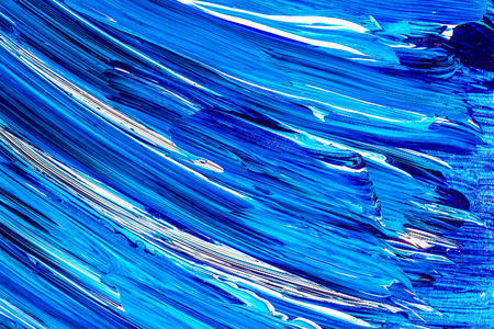 Blue white acrylic hand painted background from brush strokesの写真素材