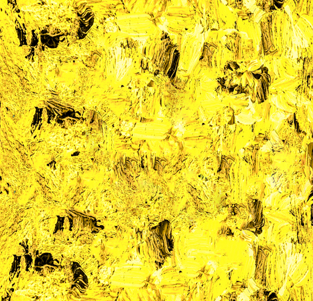 Yellow background from brush strokes and paint stains.の写真素材