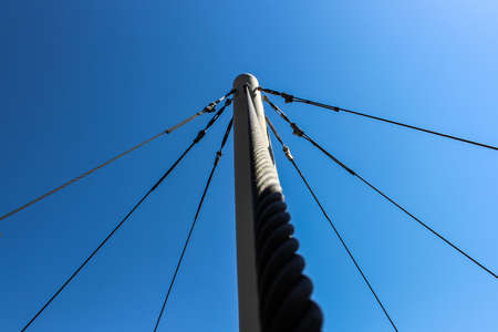 Iron pillar and cablesの写真素材