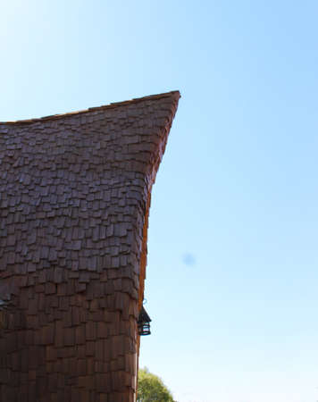 Wooden roof like in fairytale and he skyの写真素材