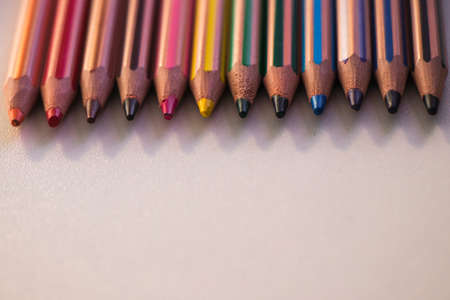 Different penciles colored on whiteの写真素材