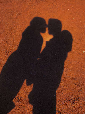 shadow of loving couple on limestone groundの写真素材