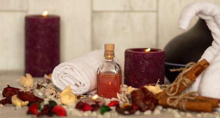 The spa essentials for aromatherapy including towel and natural oilの写真素材