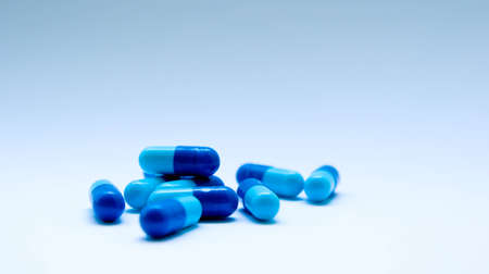 blue tablets with blue backgroundの写真素材