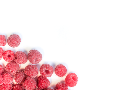 Dripping raspberry on white background.