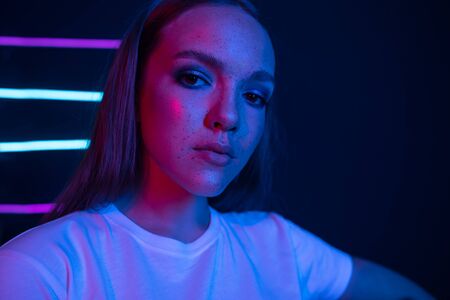 Studio portrait of a beautiful attractive athletic slim gir.の写真素材