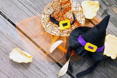 Objects Halloween decorations hat on the old wooden tableの写真素材