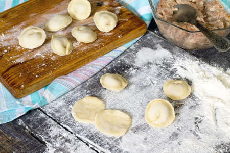 Dumplings. Dough, stuffing, the process of cooking dumplings at home.の写真素材