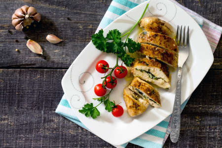 Chicken fillet baked in a rustic styleの写真素材