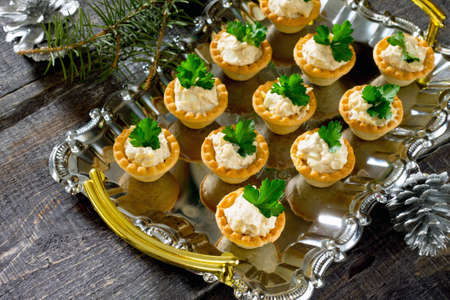 Tartlets with cod liver mousse on New Year's Eveの写真素材