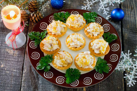 Tartlets with chicken on the eve of the New Year, selective focusの写真素材