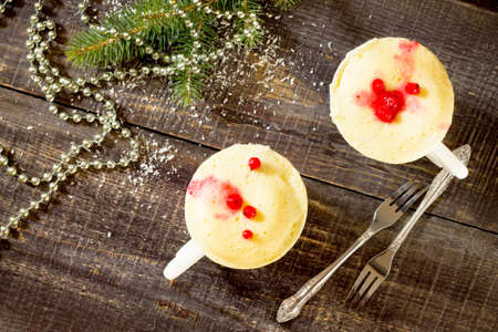 Quick food cake in a mug on a table in the New Year's Eve, the view from the top.