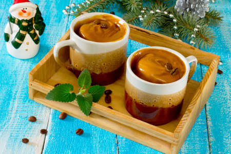 Cupcakes in a mug with cream New Year's Eve