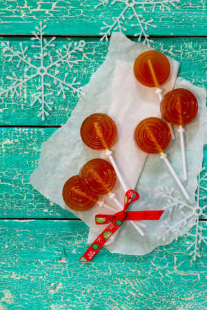 Candy lollipop on a stick ball, Christmas backgroundの写真素材