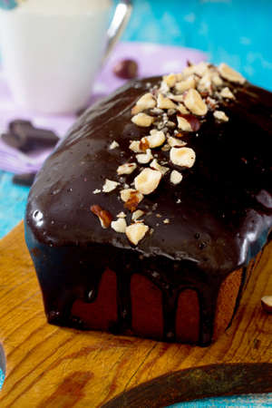 Homemade chocolate cupcake with icing, selective focus.の写真素材