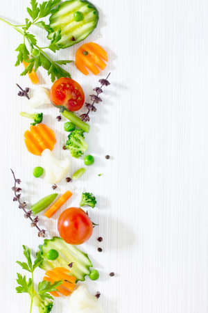 Fresh delicious ingredients for cooking on a wooden background. Diet or vegetarian food concept.の写真素材