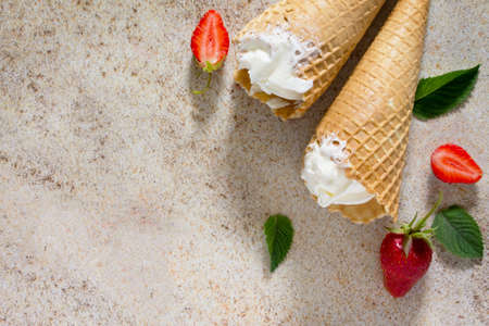 Ice cream with strawberries, place for your text.の写真素材