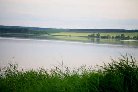Sunset scene on the river, selective focus. The Volga region, Volga river. Russia.