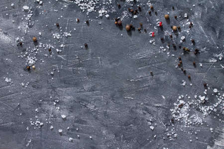 Black background cooking with fresh herbs and spices, copy space, top view.の写真素材