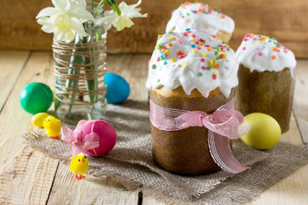 Easter background. Traditional food on the holiday table home cooking - breads and painted eggs....