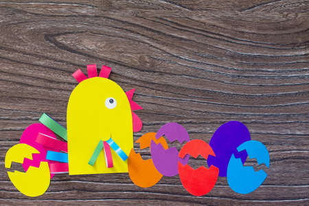 Easter greetings card handcrafted Cockerel and eggs. Children's Art Project, needlework, crafts for children. Craft for kids.の写真素材