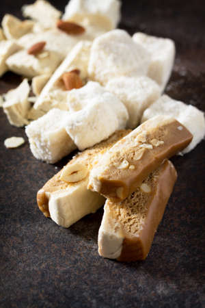 Rahat Lukum, sherbet and halva on the kitchen table. Turkish and Arabic sweets. Ramadan food. Close-up.の写真素材
