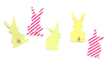 Easter bunny (Easter rabbit) craft of paper, isolated on white background. Festive decor of...