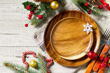 Festive table setting for holiday. Christmas decoration, plate and cutlery on festive table....
