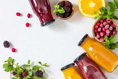 Healthy Juicy Vitamin Drink Diet or Vegan Food Concept, fresh fruit and berry. Top view flat lay...