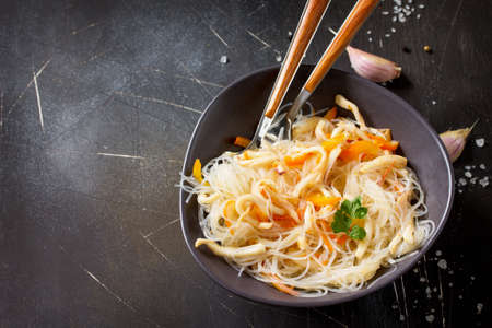 Asian food, Funchoza salad with  stir fry Squids and Vegetables. Copy space.の写真素材