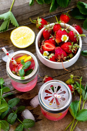 Fresh Strawberry lemonade on rustic wooden table. 
の写真素材