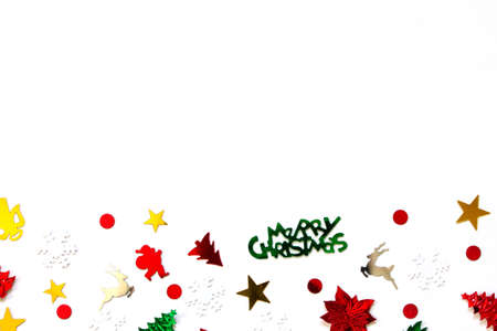 Christmas or new year composition. Christmas confetti isolated on a white background. Top view.