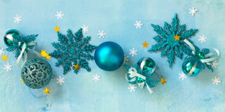Christmas decor on a blue background. Top view of a flat lay background.