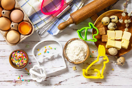 Baking or cooking background frame. Ingredients, kitchen items for Easter festive baking. Kitchen...