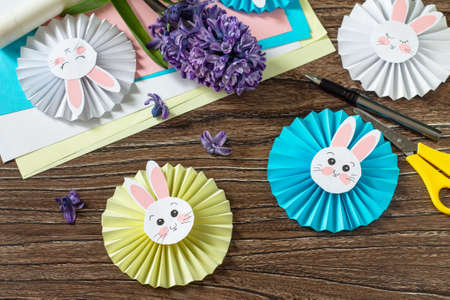 Children's paper decor. Funny paper easter bunny. Easter handmade Project of children's creativity,...