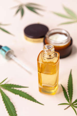 SPA organic beauty product. Herbal Alternative Medicine Concept. Cannabis cosmetic cream, face serum...