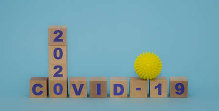 the name of the coronavirus is written on the cubesの写真素材
